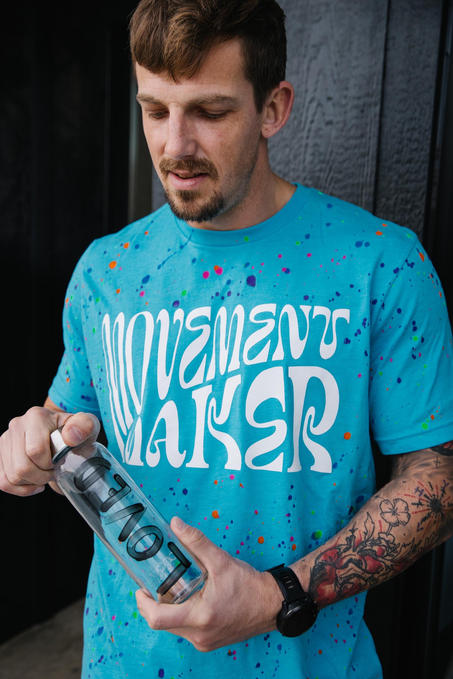 "Movement Maker" Paint Splatter Tee